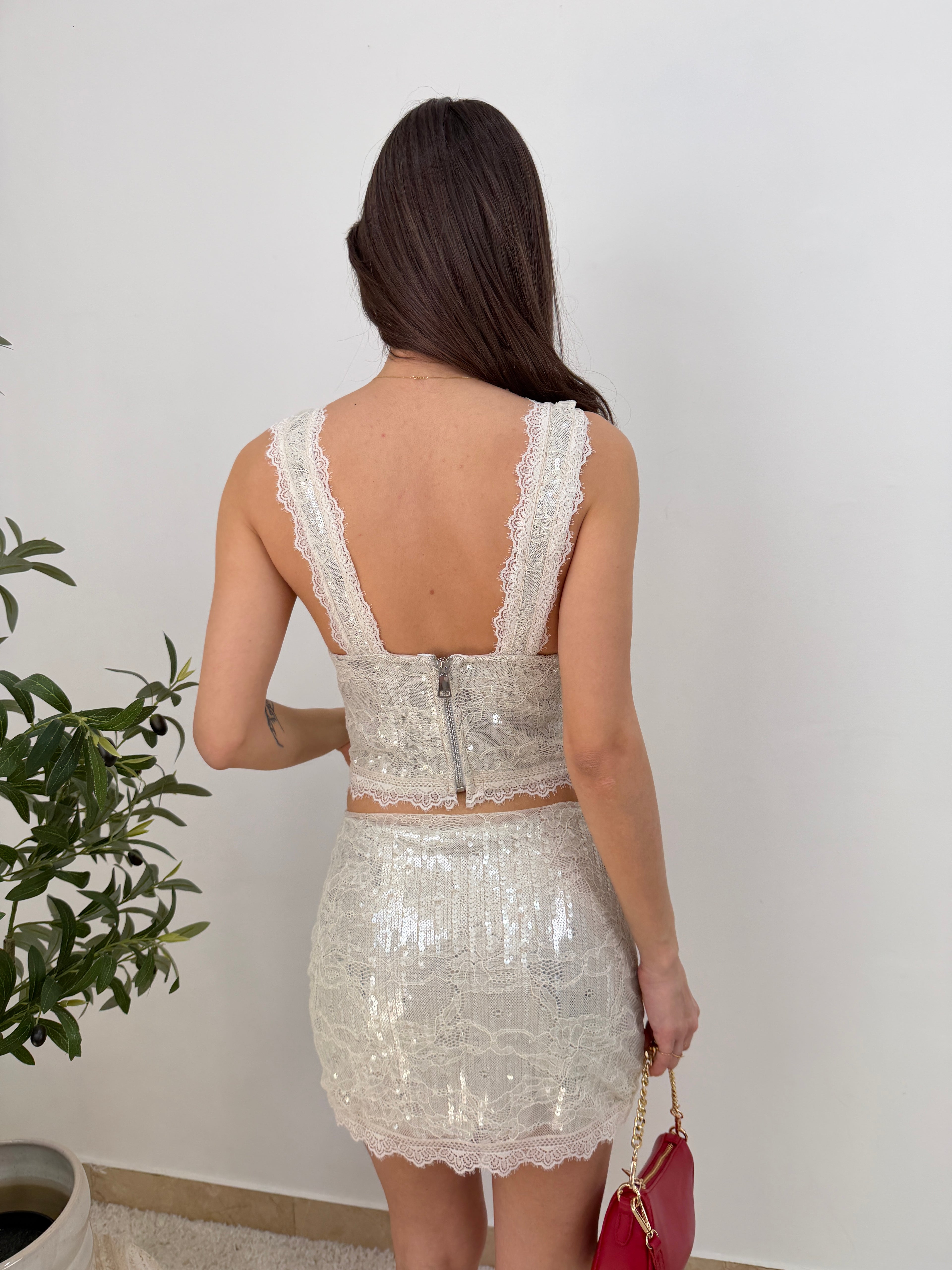 Completo pizzo e paillettes top + mini gonna