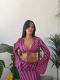 Coordinato con top a maniche lunghe e gonna lunga drappeggiata