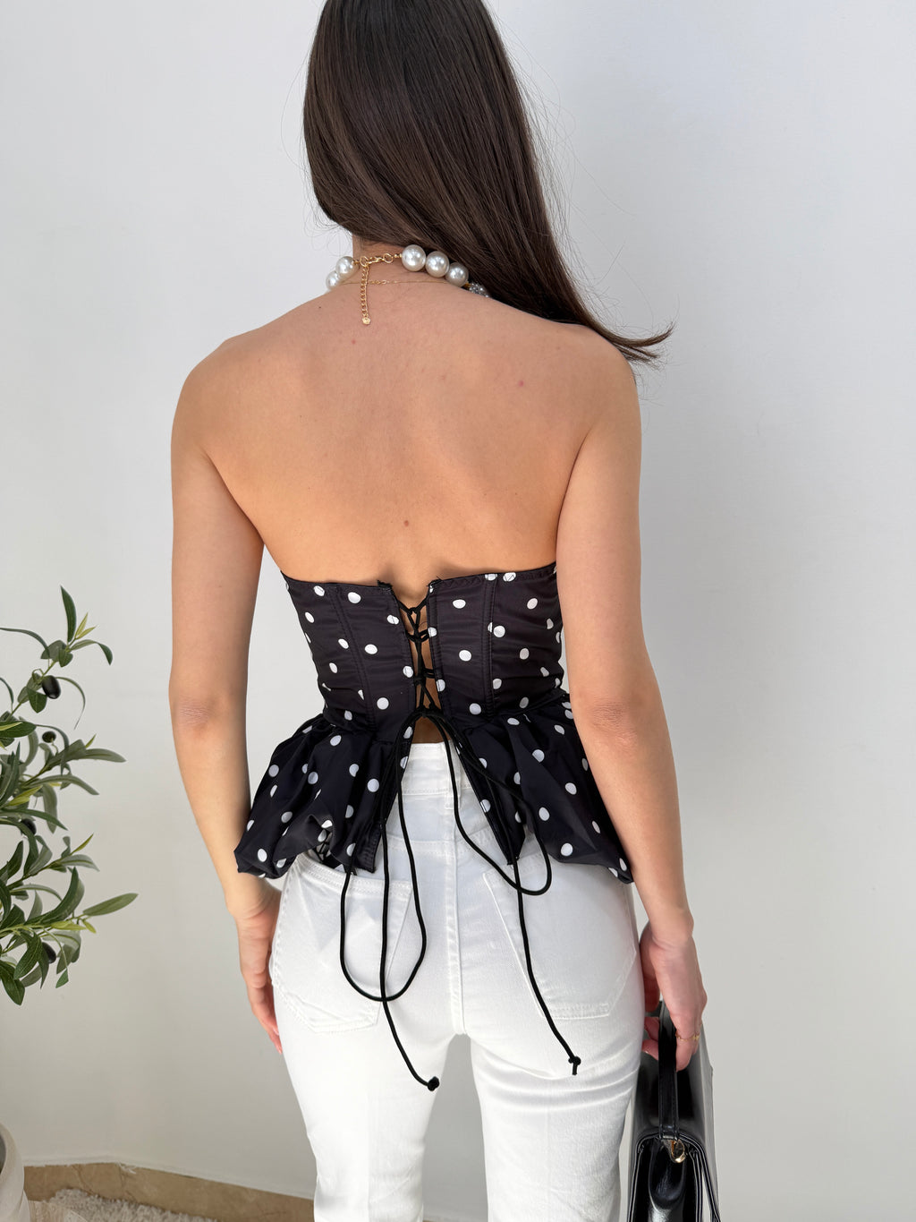 Top bustier a pois con balza