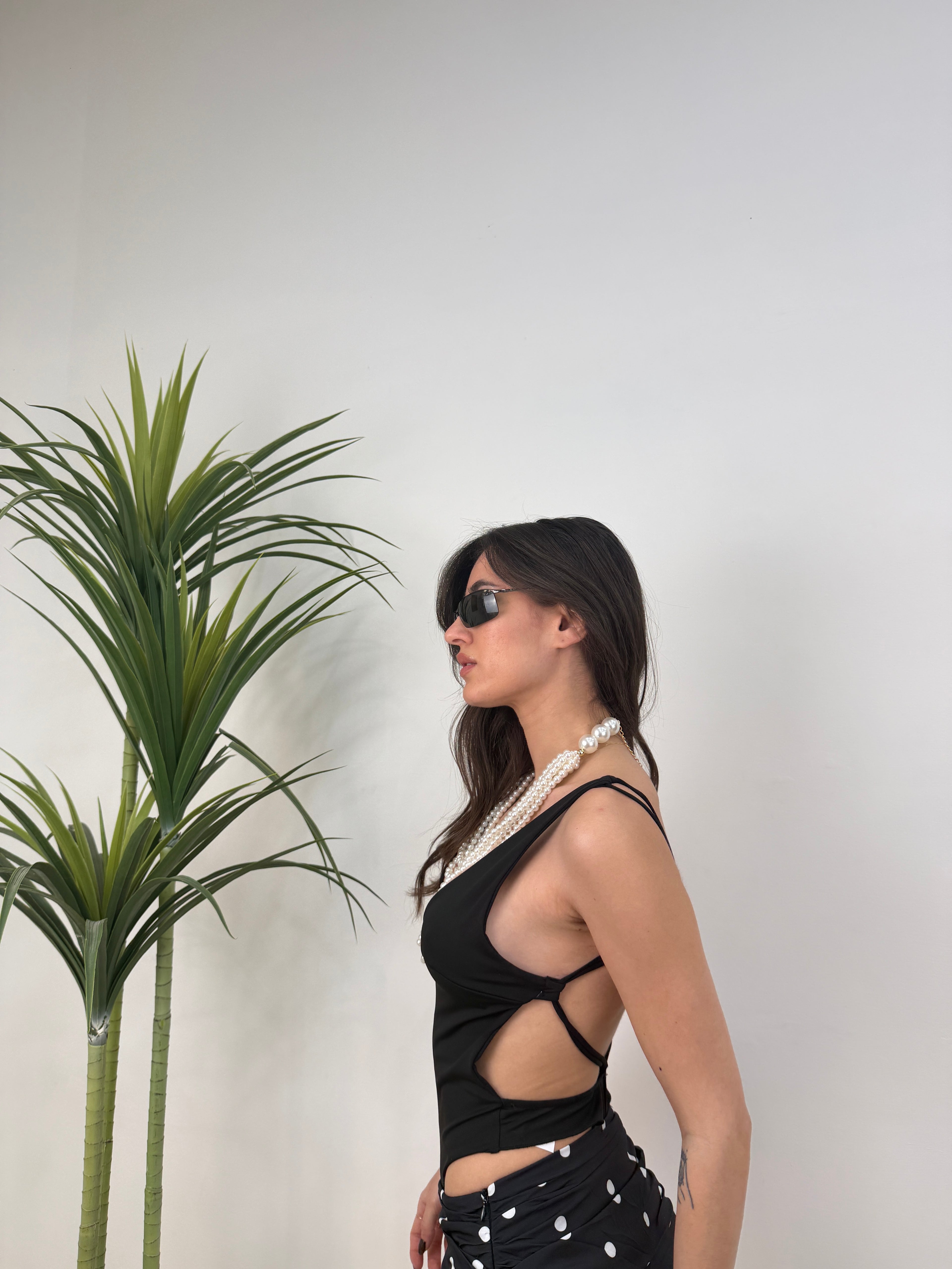 Body sgambato con scollo profondo e schiena scoperta