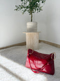 Borsa a spalla lucida con dettagli gold
