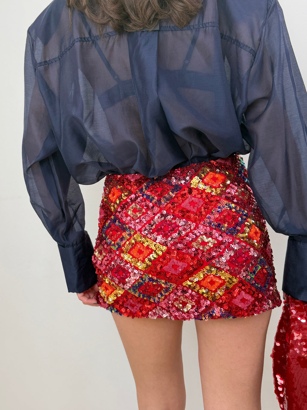 Gonna short paillettes multicolor effetto glam