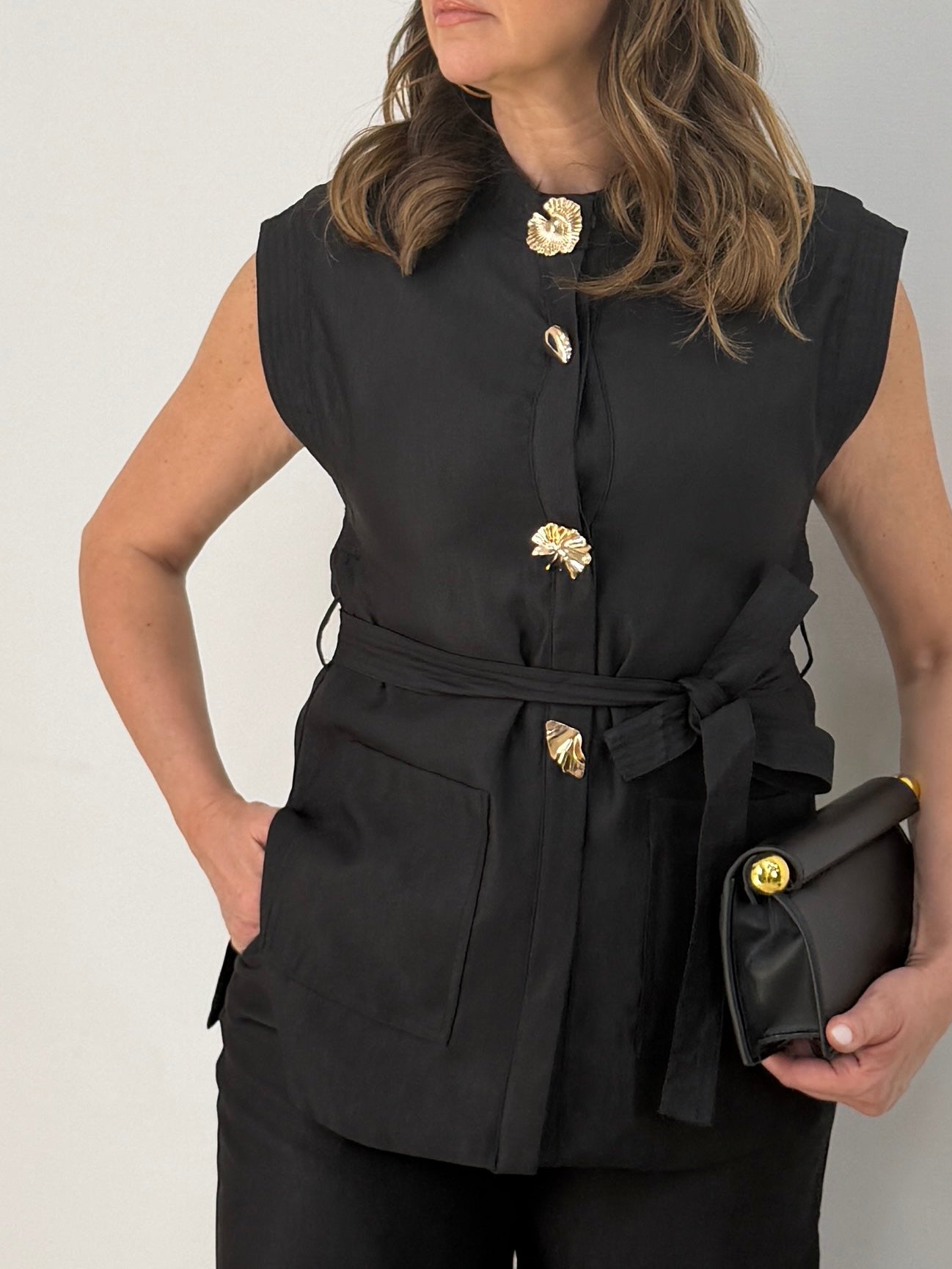 Coordinato con gilet smanicato e pantalone palazzo