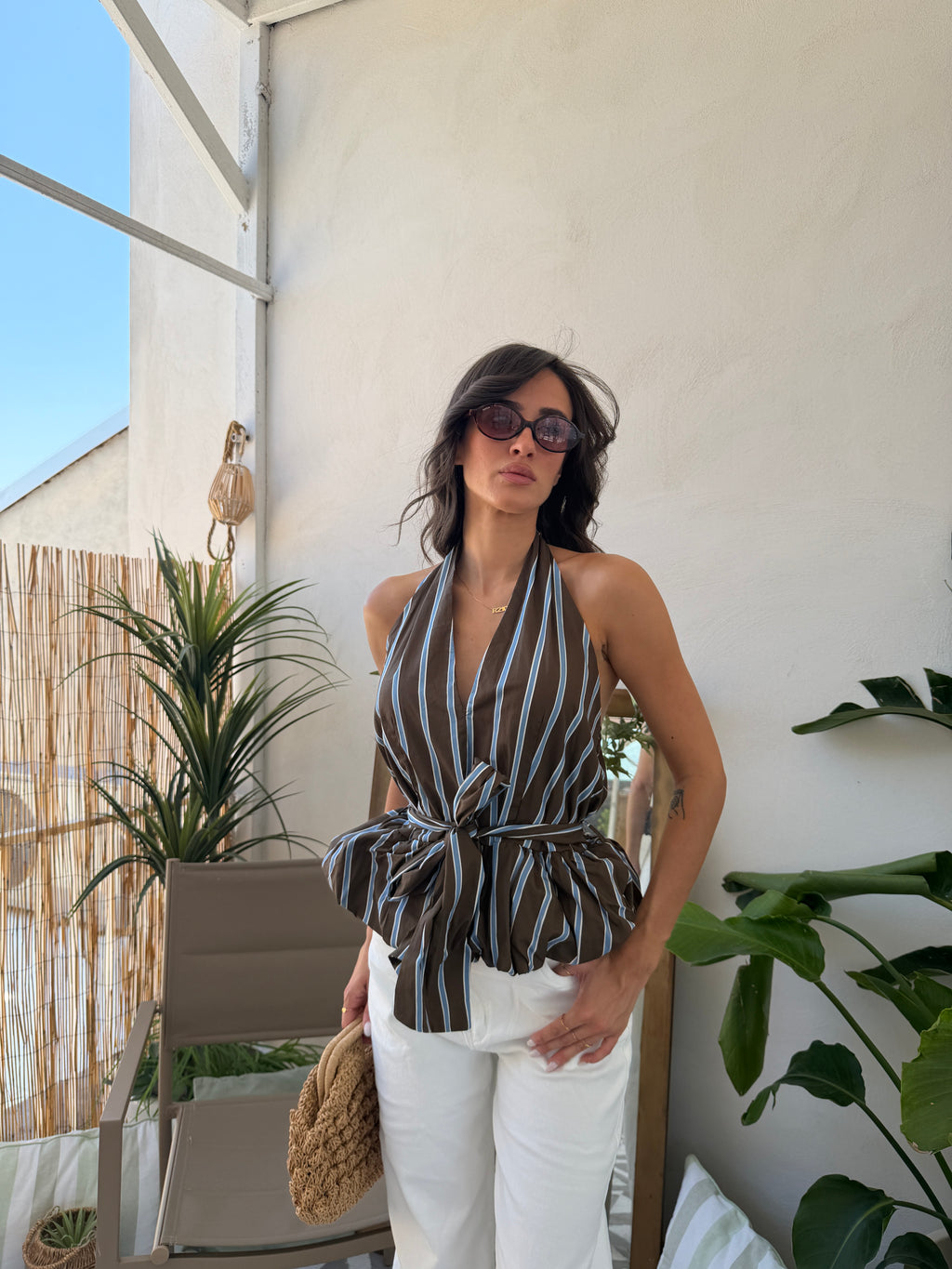 Top a righe con fiocco in vita