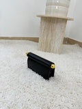 Borsa clutch nera con dettagli a sfera oro