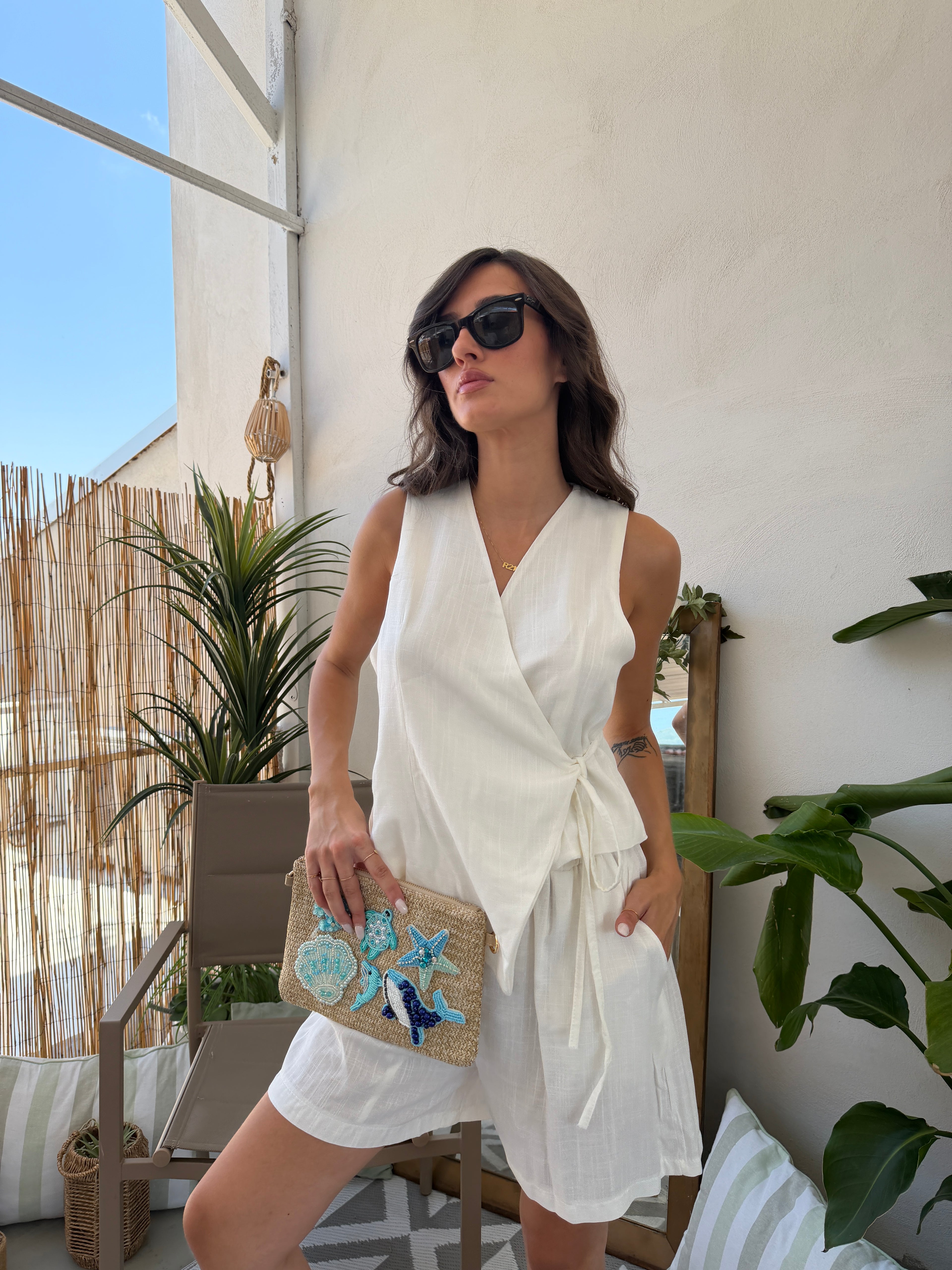 Completo gilet incrociato e bermuda