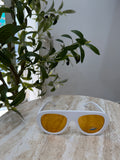 Occhiali da sole bianchi oversize con lenti gialle