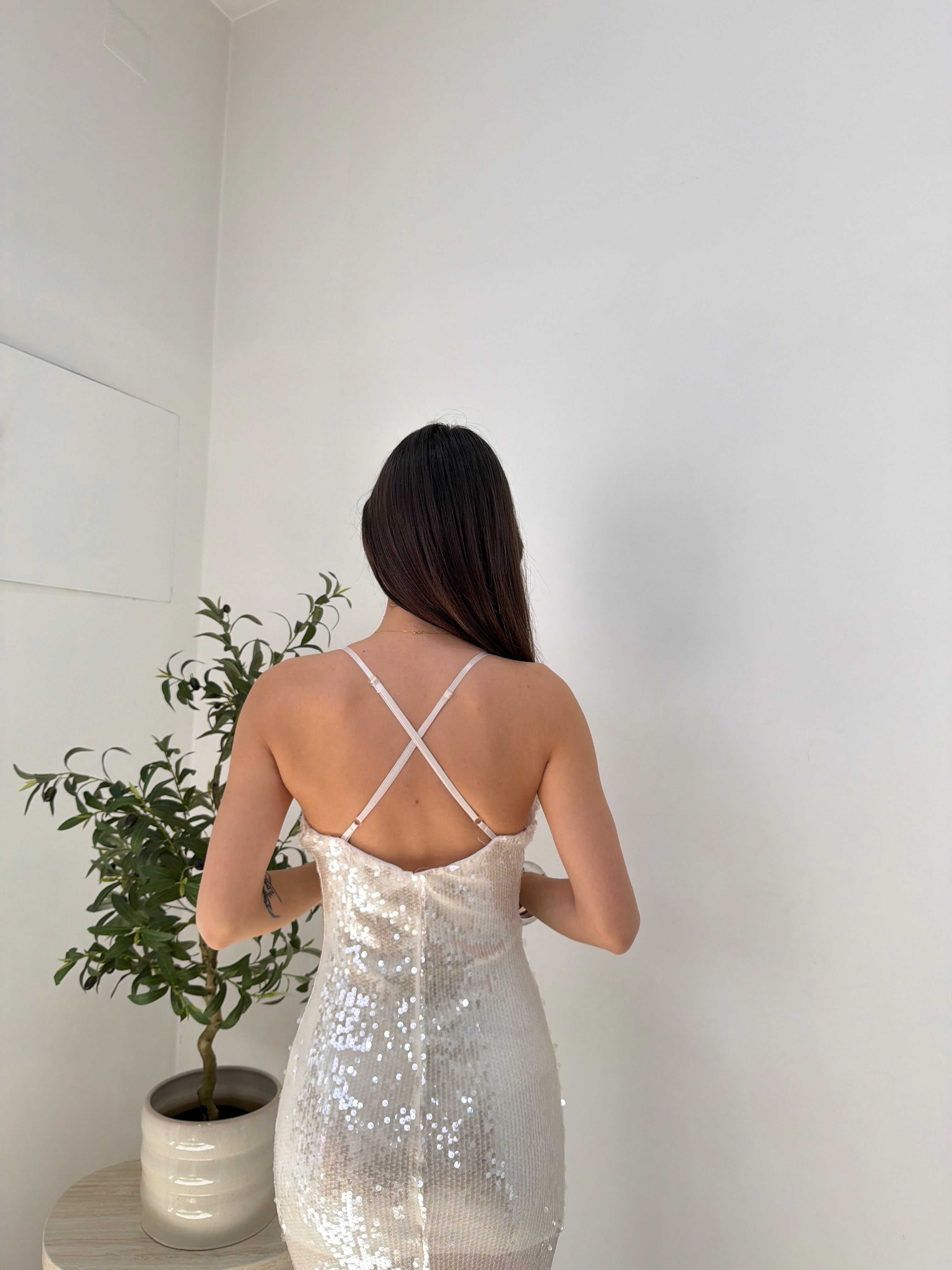 Abito lungo paillettes con scollo profondo