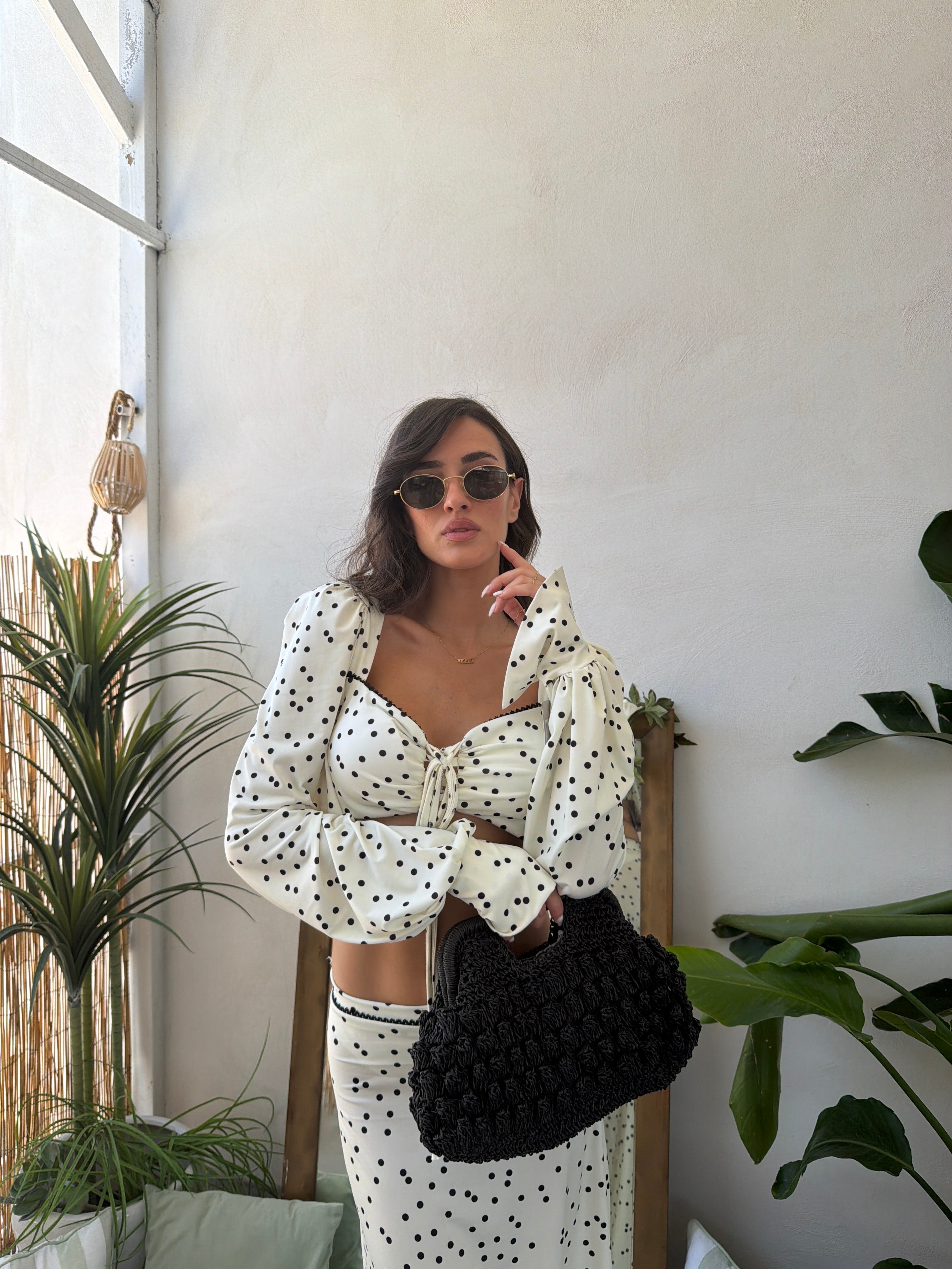 Completo due pezzi con top a pois e gonna lunga coordinata