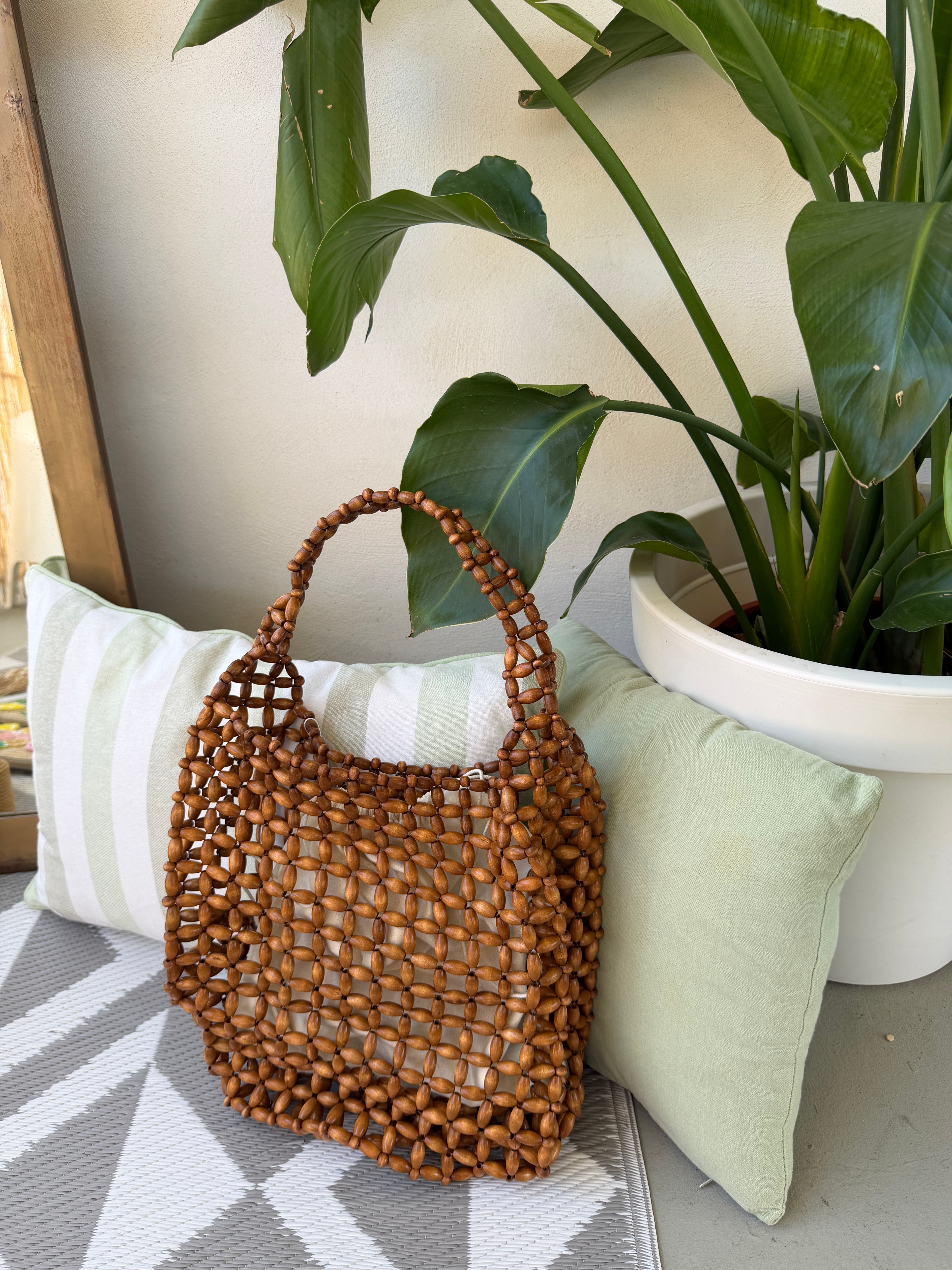 Borsa con perline effetto intrecciato