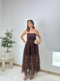 Abito in tulle con corpetto in pizzo e gonna a balze