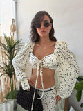 Completo due pezzi con top a pois e gonna lunga coordinata