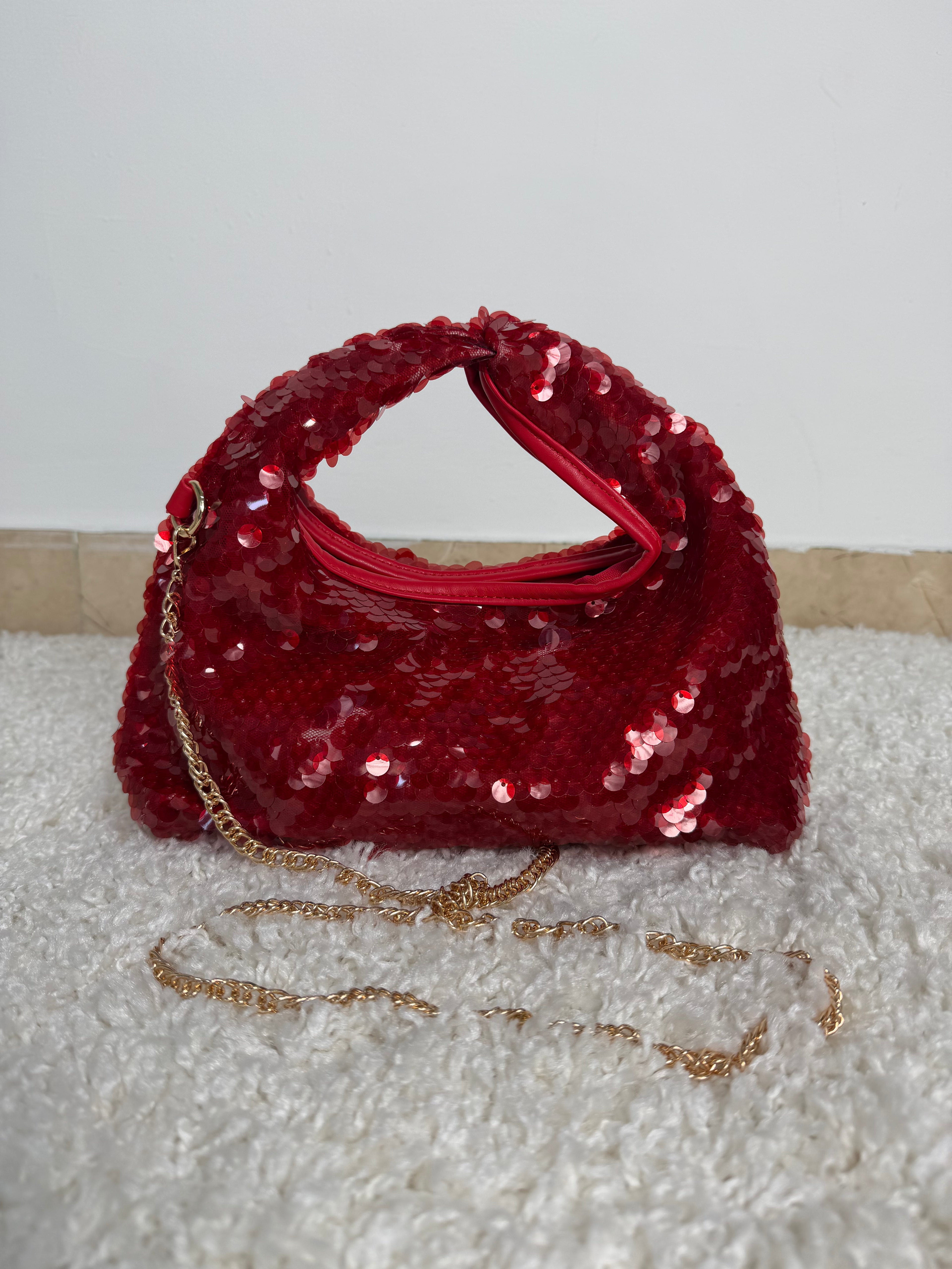 Borsa a mano  con paillettes rosse e catena dorata