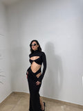 Abito lungo aderente con cut-out e drappeggio
