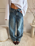 jeans wide leg con a risvolto a v