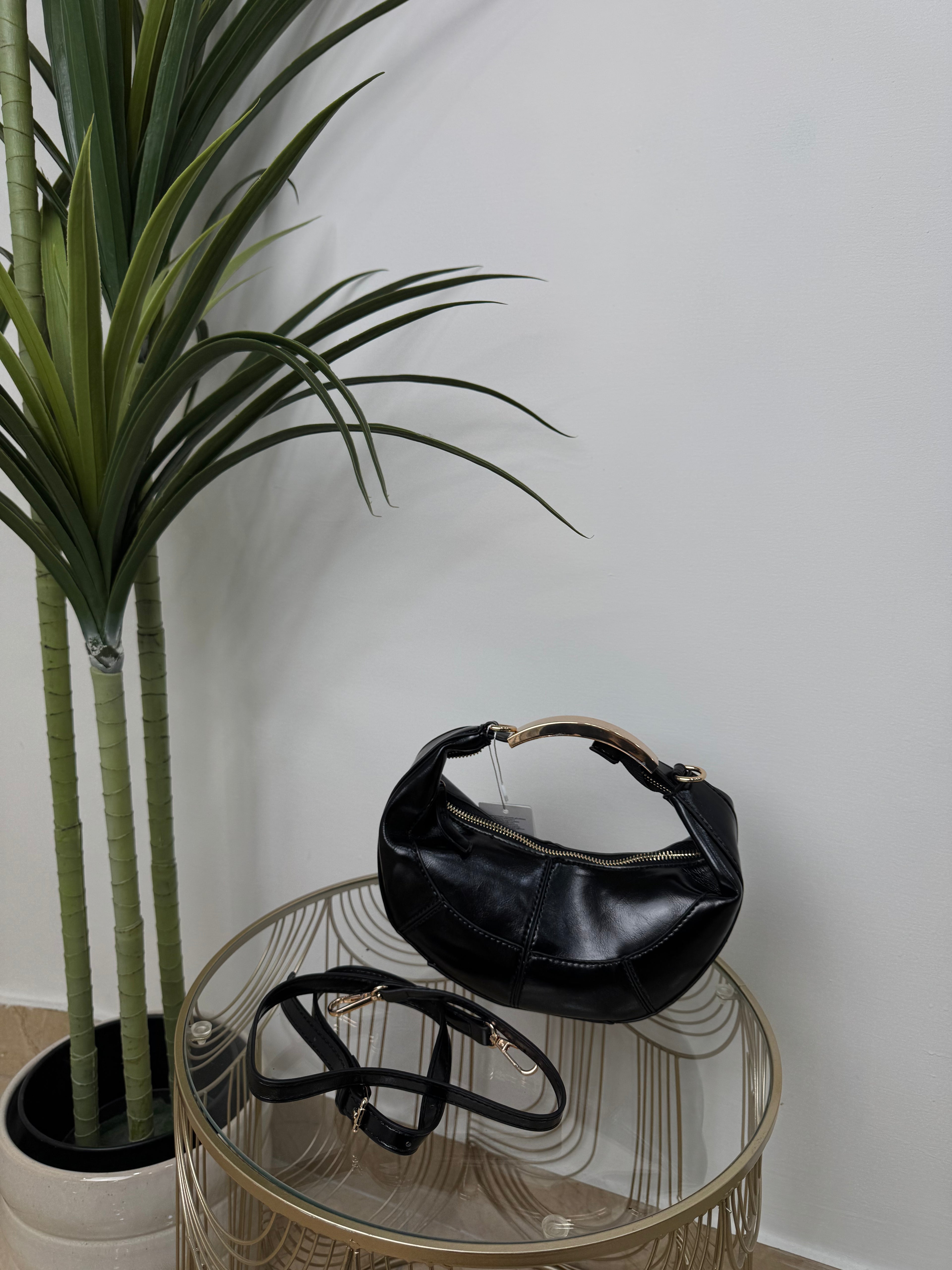 Borsa a spalla effetto luna – design morbido e moderno