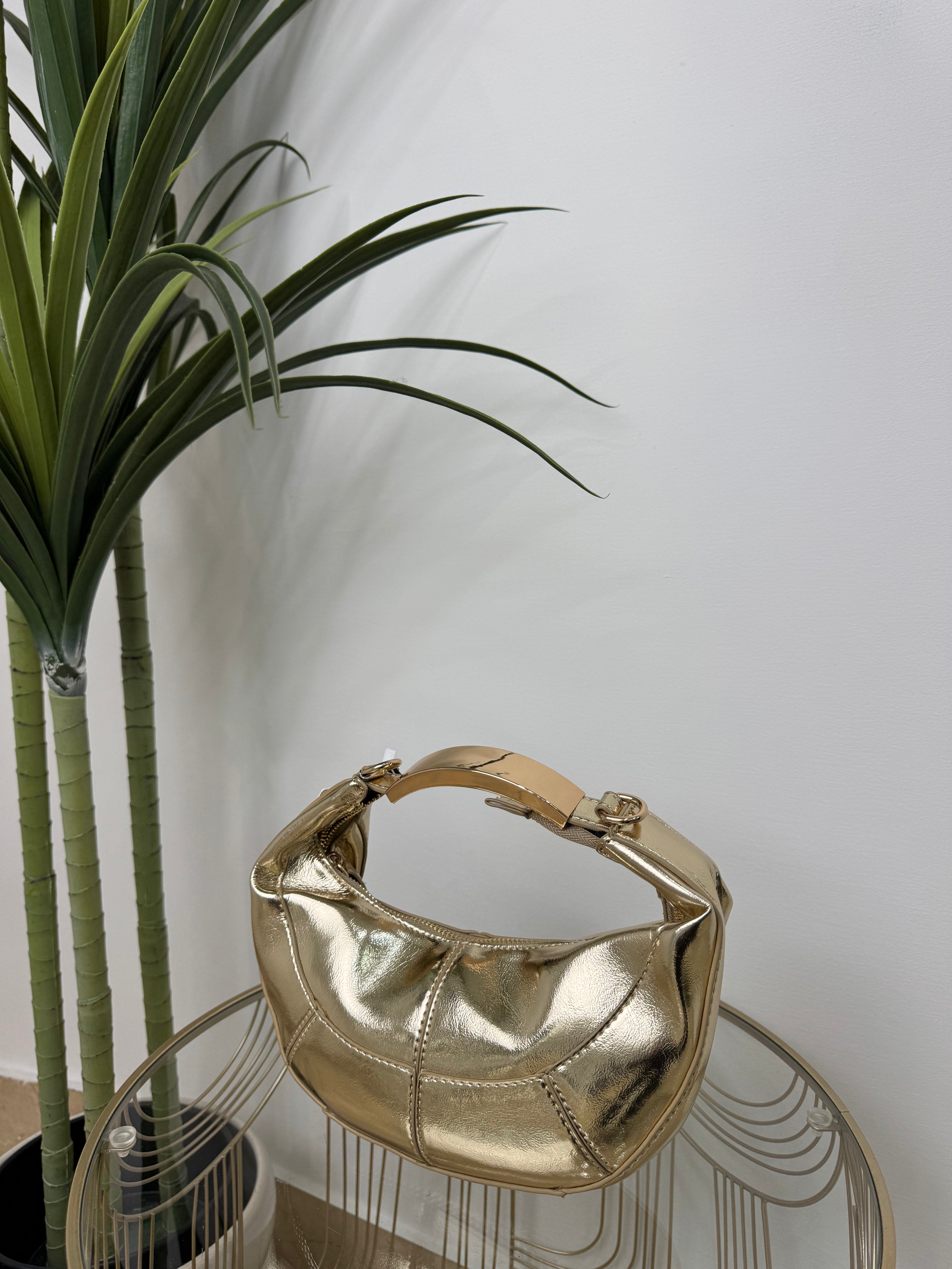 Borsa a spalla effetto luna – design morbido e moderno