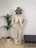 Completo   con blazer con fusciacca al collo e pantalone palazzo a vita alta