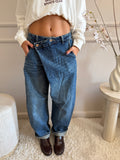 jeans wide leg con chiusura asimmetrica