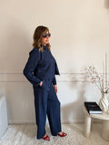 Coordinato gessato con blazer cropped e pantalone palazzo