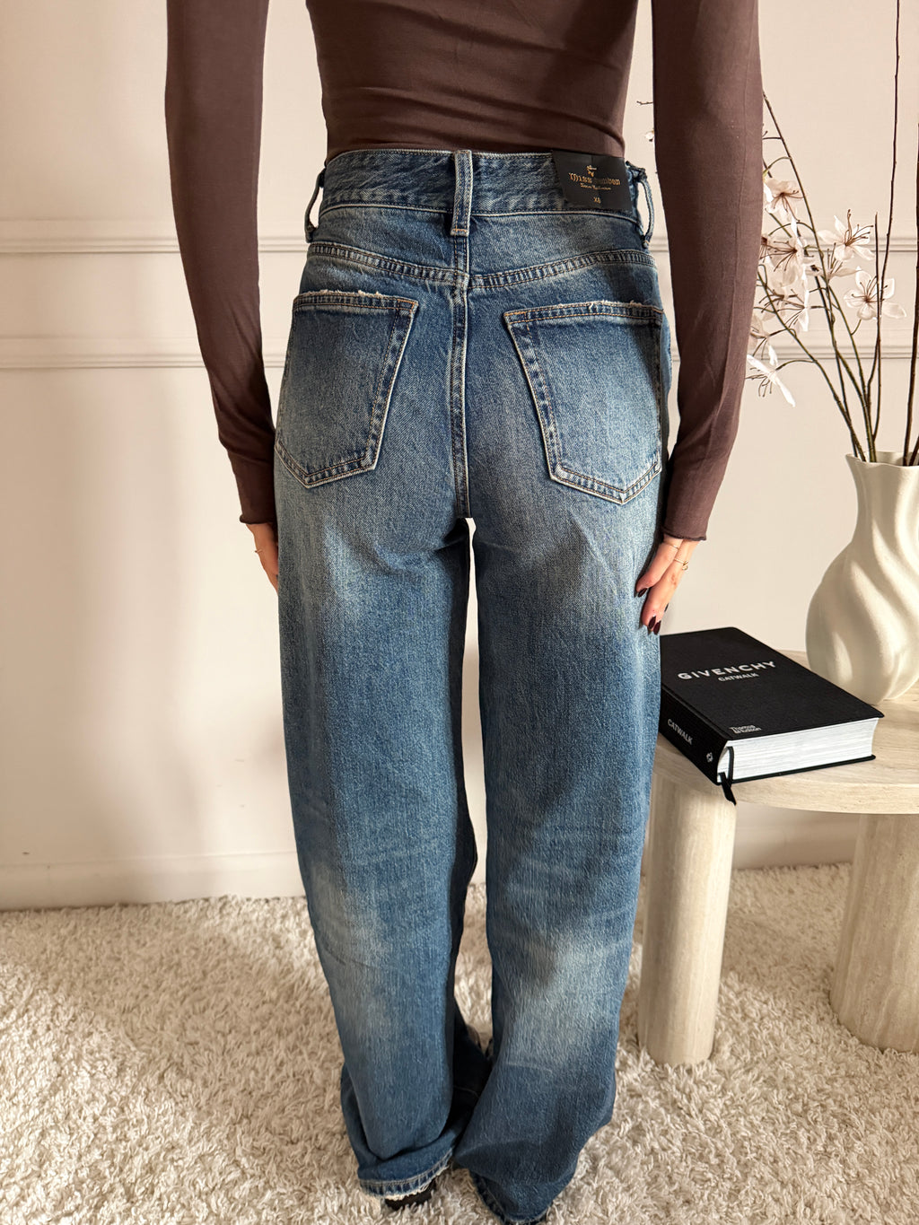 Jeans wide leg con orlo sfrangiato