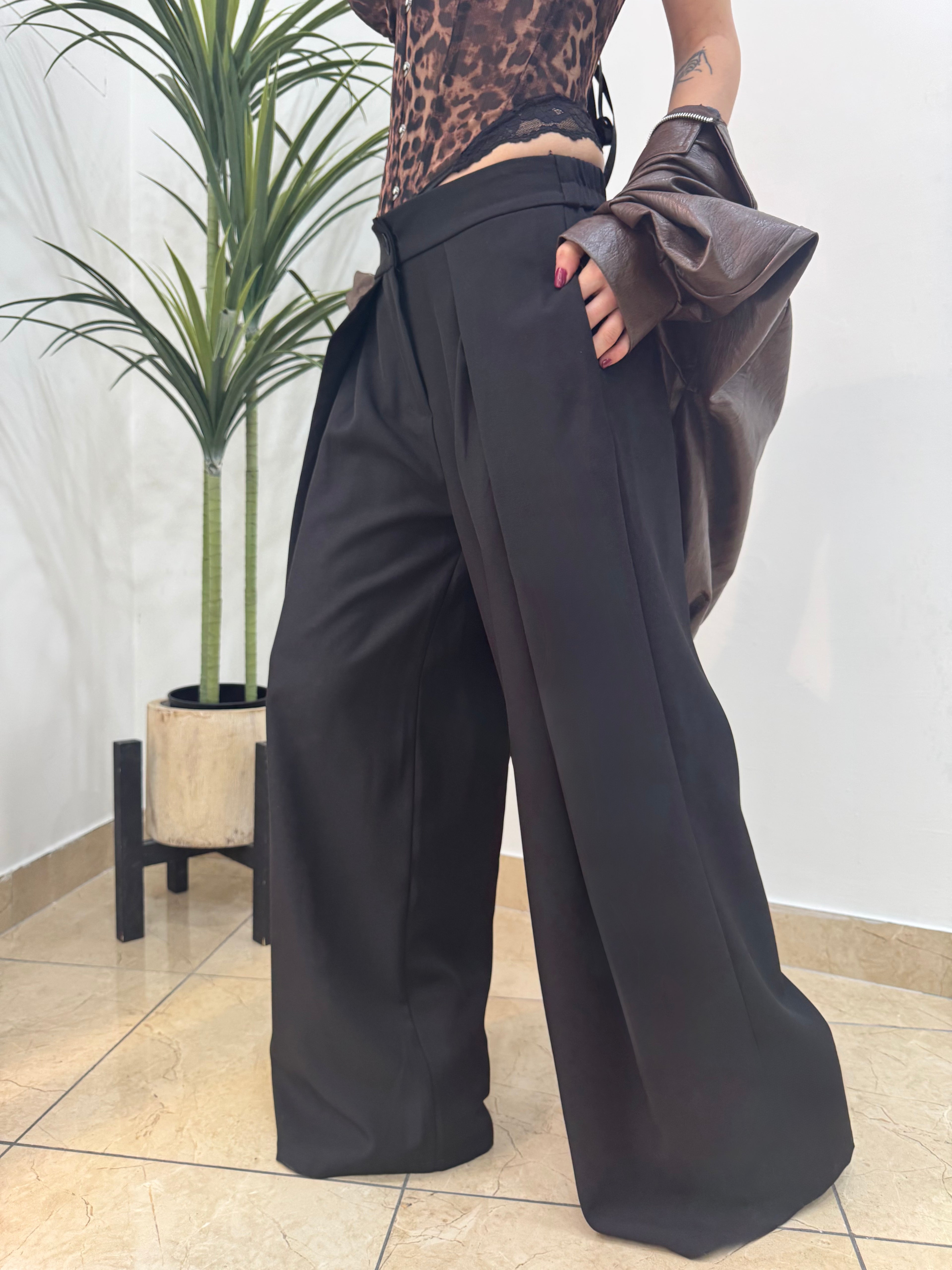 Pantalone a palazzo e pinces