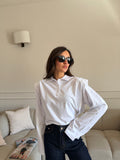 Polo in cotone crop con spalline imbottite