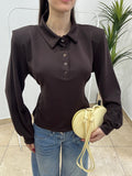 Polo con spalline